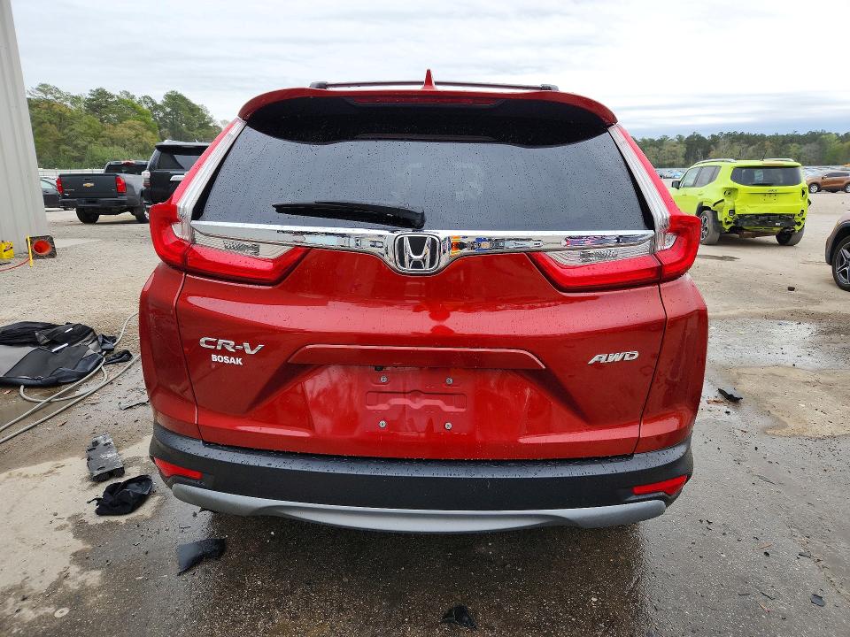 Photo 6 from auction – 2017 HONDA CR-V with VIN 5J6RW2H50HL070992