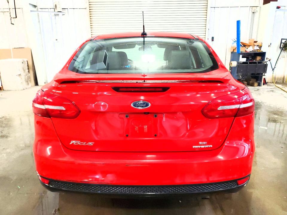 Photo 6 from auction – 2015 FORD FOCUS with VIN 1FADP3F2XFL220668