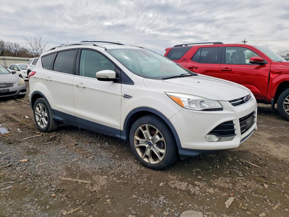 Photo 4 from auction – 2014 FORD ESCAPE with VIN 1FMCU9JX1EUE32173