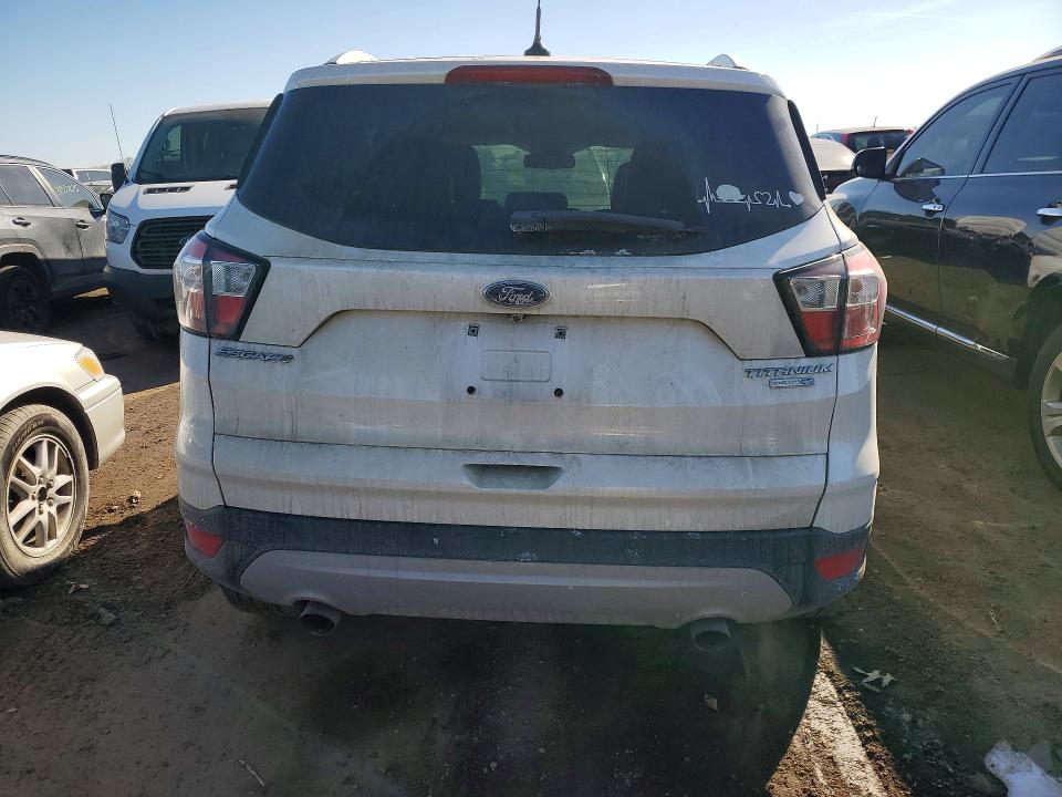 Photo 6 from auction – 2018 FORD ESCAPE with VIN 1FMCU9J98JUC11469