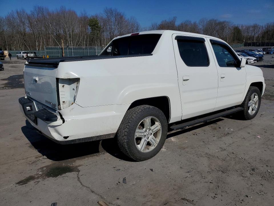 Photo 3 from auction – 2014 HONDA RIDGELINE with VIN 5FPYK1F50EB004183