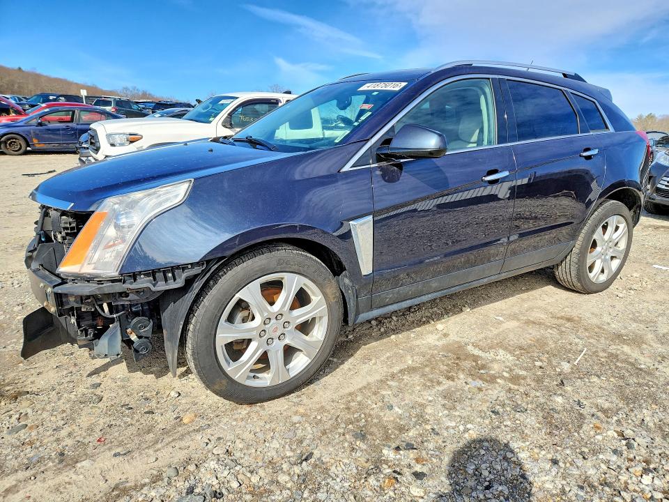 CADILLAC SRX 2014 with VIN 3GYFNFE39ES575984 - Photo from auction