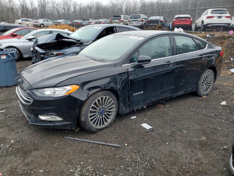 FORD FUSION 2018 with VIN 3FA6P0LU0JR137628 - Photo from auction