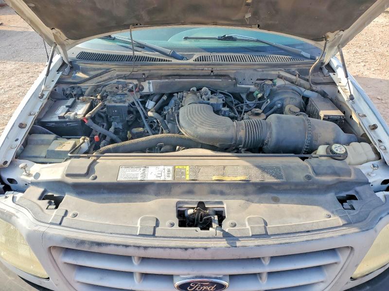 Photo 11 from auction – 2002 FORD F150 with VIN 3FTRF18WX2MA18140