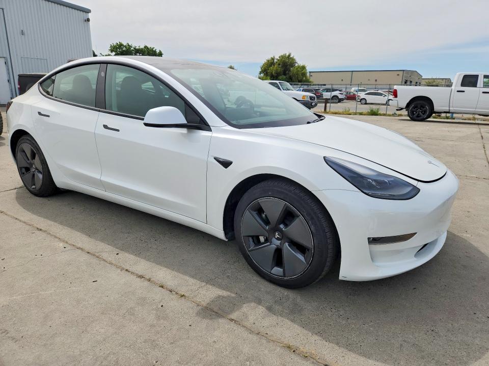 Photo 4 from auction – 2021 TESLA MODEL 3 with VIN 5YJ3E1EBXMF941736