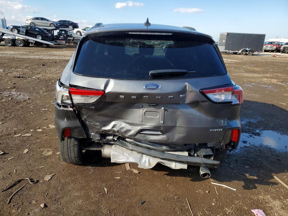Photo 6 from auction – 2021 FORD ESCAPE with VIN 1FMCU9H65MUA64415