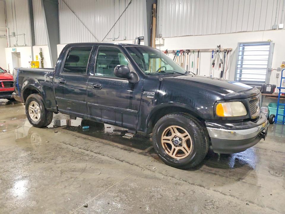 Photo 4 from auction – 2002 FORD F150 with VIN 1FTRW07652KD46147