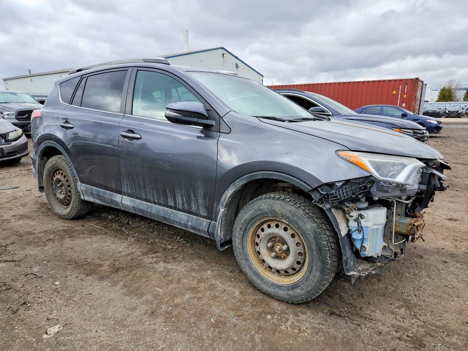 Photo 4 from auction – 2018 TOYOTA RAV4 with VIN 2T3ZFREV0JW512661