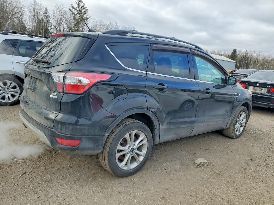 Photo 3 from auction – 2017 FORD ESCAPE with VIN 1FMCU9G9XHUA16796