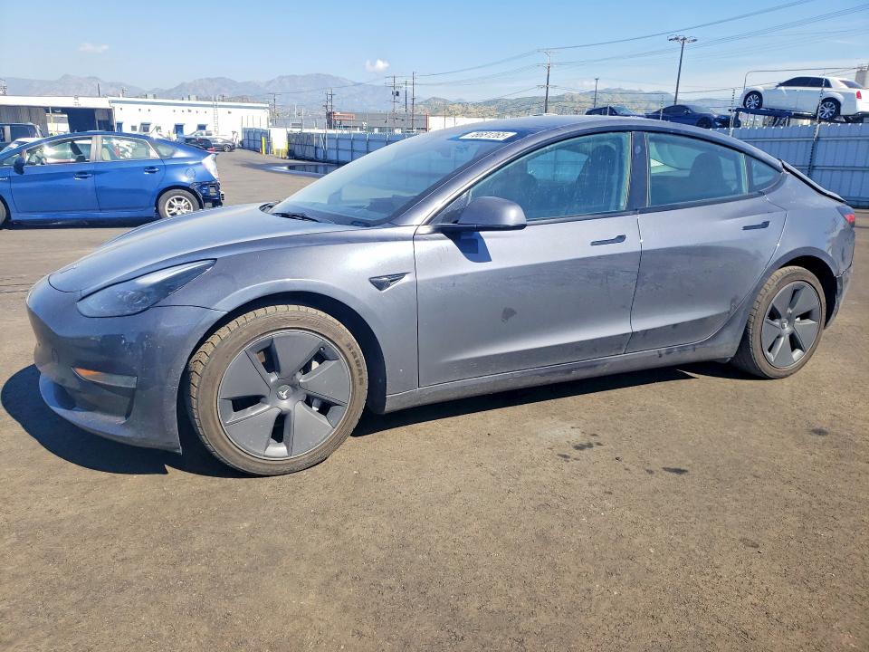 TESLA MODEL 3 2023 with VIN 5YJ3E1EA4PF433967 - Photo from auction