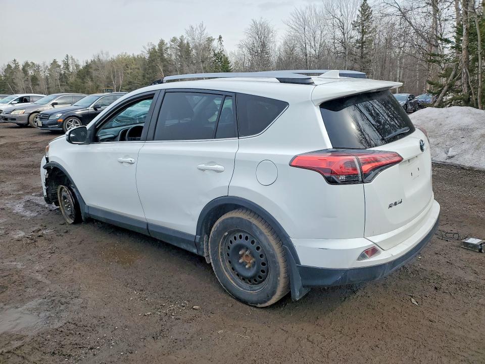 Photo 2 from auction – 2018 TOYOTA RAV4 with VIN 2T3ZFREV3JW435669