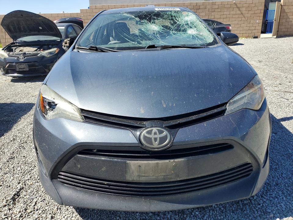 Photo 5 from auction – 2017 TOYOTA COROLLA with VIN 5YFBURHEXHP709800