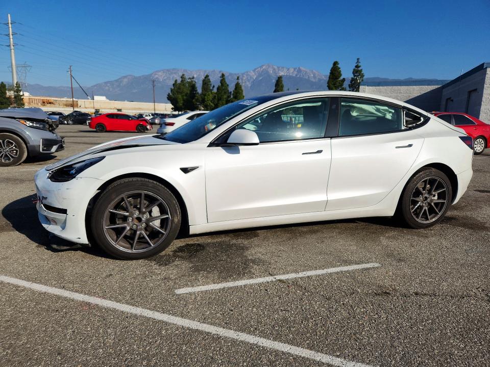 TESLA MODEL 3 2023 with VIN 5YJ3E1EA2PF572723 - Photo from auction