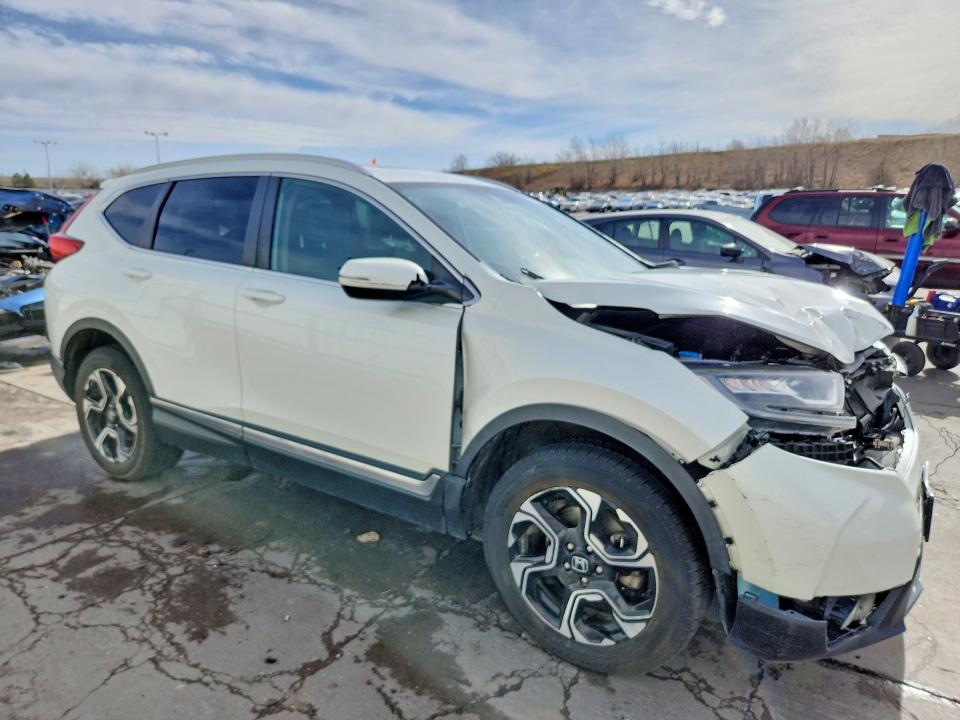 Photo 4 from auction – 2018 HONDA CR-V with VIN 2HKRW2H98JH640840