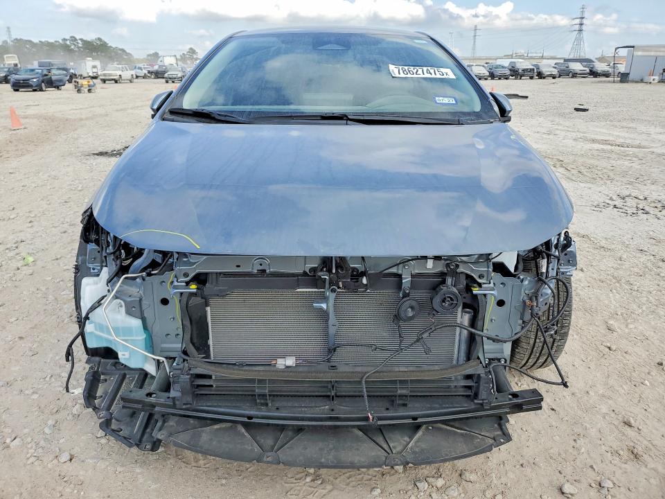 Photo 5 from auction – 2025 TOYOTA COROLLA with VIN JTDBCMFE3S3102629