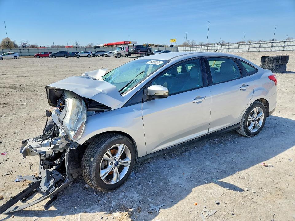 FORD FOCUS 2014 with VIN 1FADP3F28EL329449 - Photo from auction
