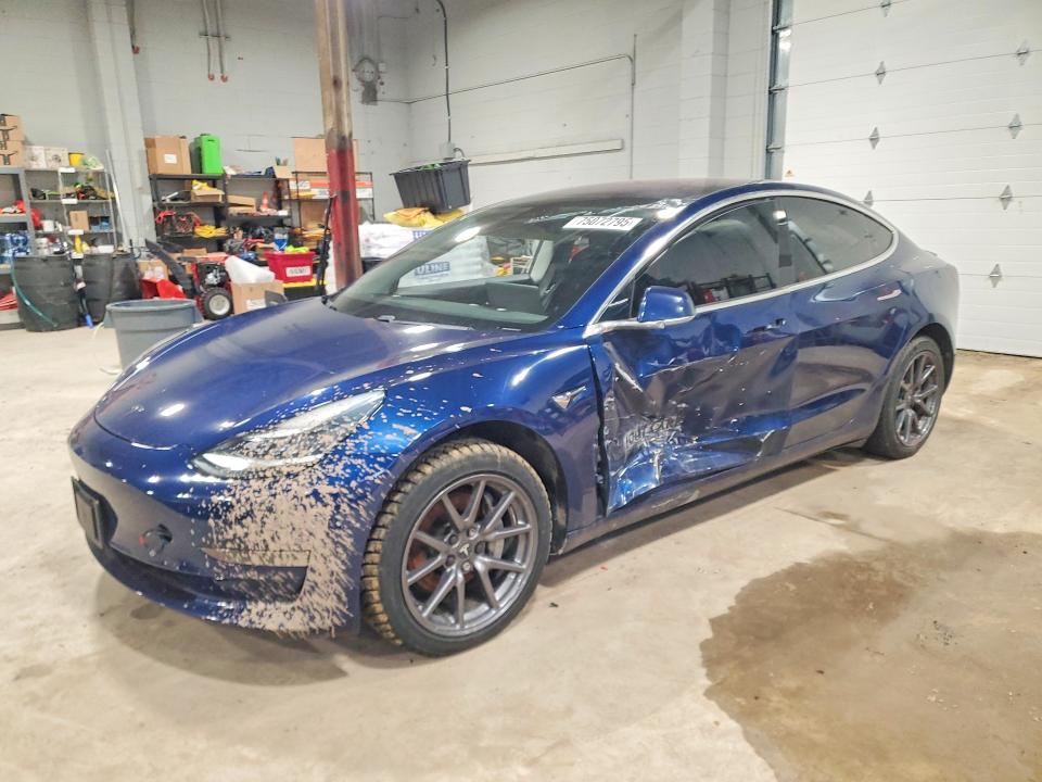 TESLA MODEL 3 2018 with VIN 5YJ3E1EA4JF022852 - Photo from auction