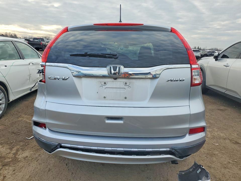 Photo 6 from auction – 2015 HONDA CR-V with VIN 5J6RM4H5XFL079245