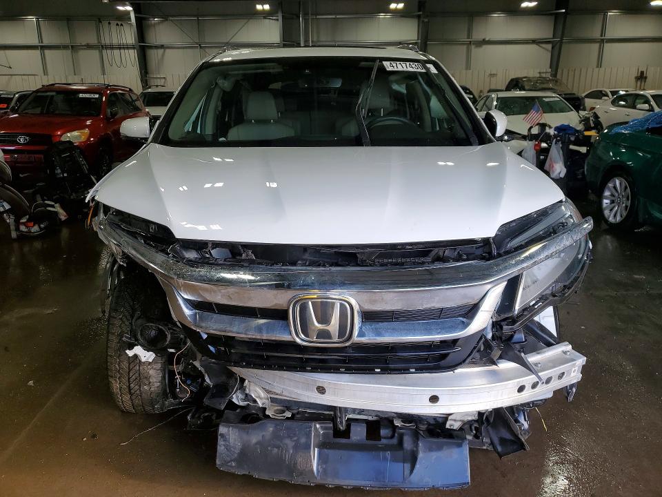 Photo 5 from auction – 2021 HONDA PILOT with VIN 5FNYF6H65MB018739