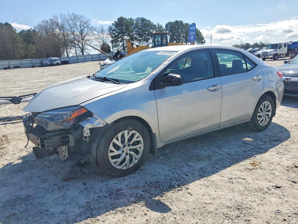 TOYOTA COROLLA 2017 with VIN 5YFBURHE3HP719715 - Photo from auction