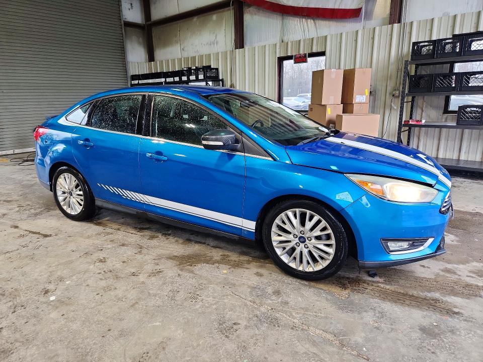 Photo 4 from auction – 2016 FORD FOCUS with VIN 1FADP3J21GL363761