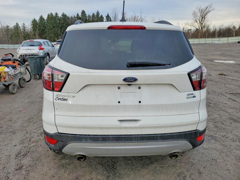 Photo 6 from auction – 2018 FORD ESCAPE with VIN 1FMCU9HD8JUA80943