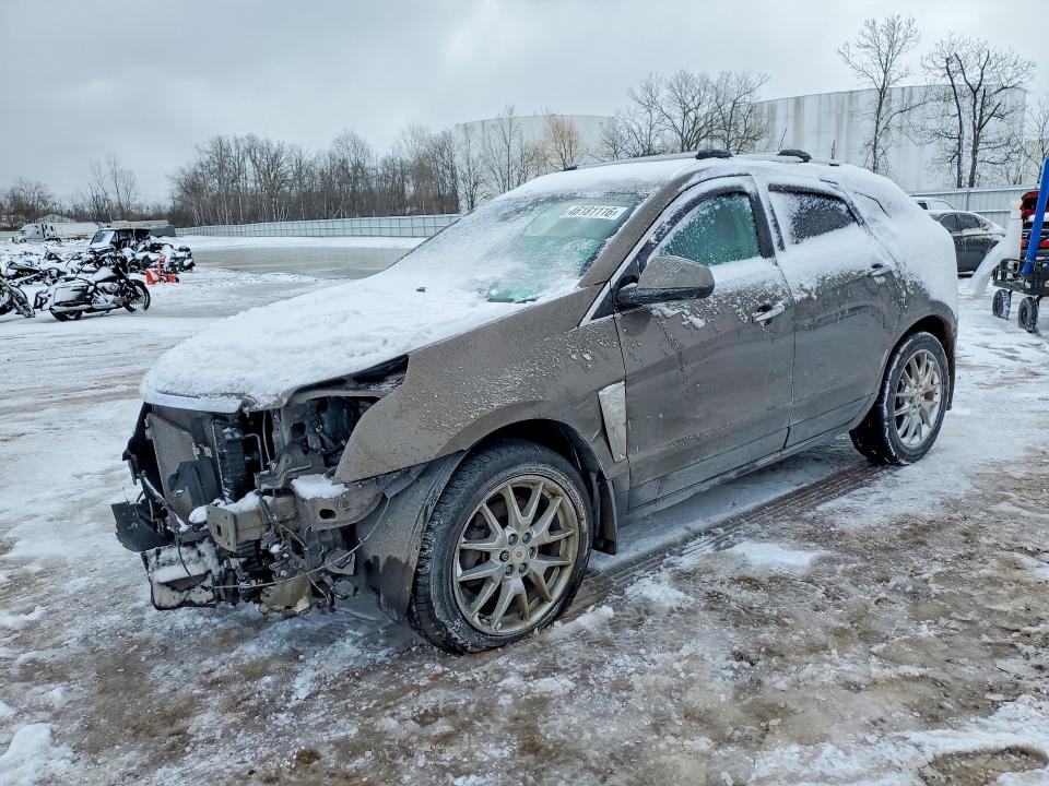 CADILLAC SRX 2014 with VIN 3GYFNGE38ES565355 - Photo from auction