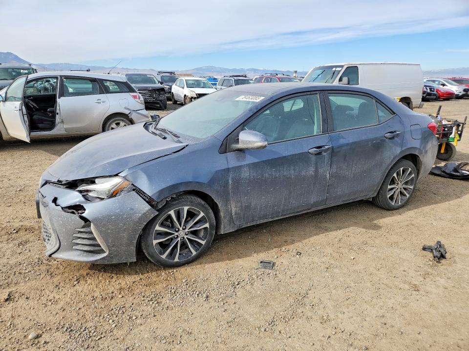 TOYOTA COROLLA 2018 with VIN 2T1BURHE8JC988525 - Photo from auction