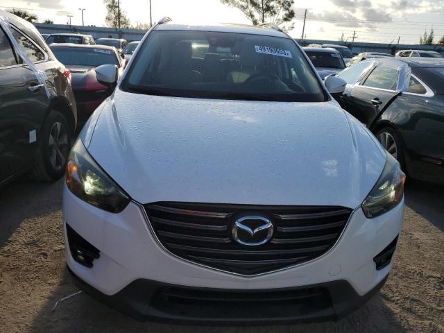 Photo 5 from auction – 2016 MAZDA CX-5 TOURI with VIN JM3KE2CY0G0719886