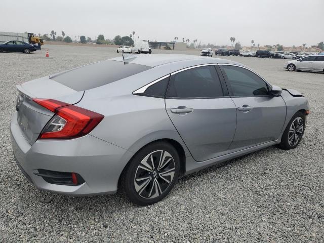 Photo 3 from auction – 2016 HONDA CIVIC EXL with VIN 2HGFC1F74GH652395