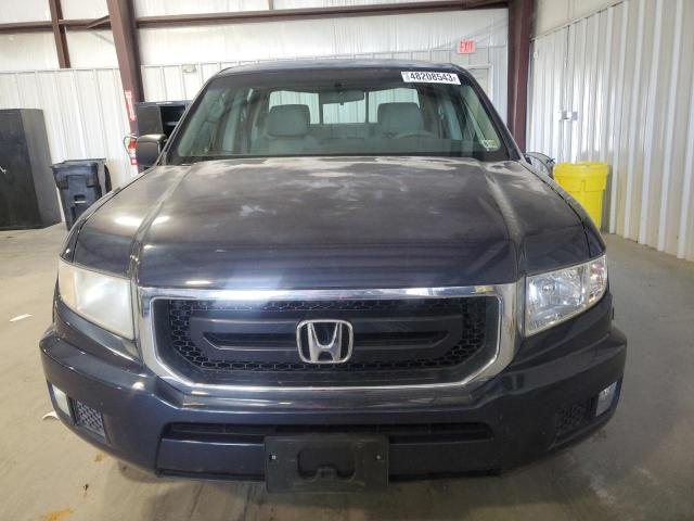 Photo 5 from auction – 2009 HONDA RIDGELINE with VIN 5FPYK16229B107245