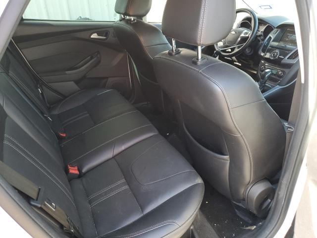Photo 10 from auction – 2014 FORD FOCUS TITA with VIN 1FADP3N20EL259043