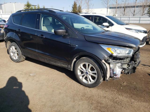 Photo 4 from auction – 2018 FORD ESCAPE SEL with VIN 1FMCU0HD9JUA99934