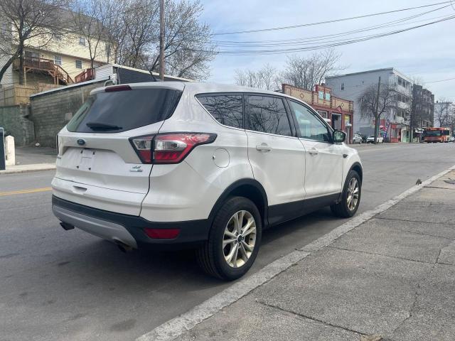 Photo 4 from auction – 2017 FORD ESCAPE SE with VIN 1FMCU9GD9HUC40629