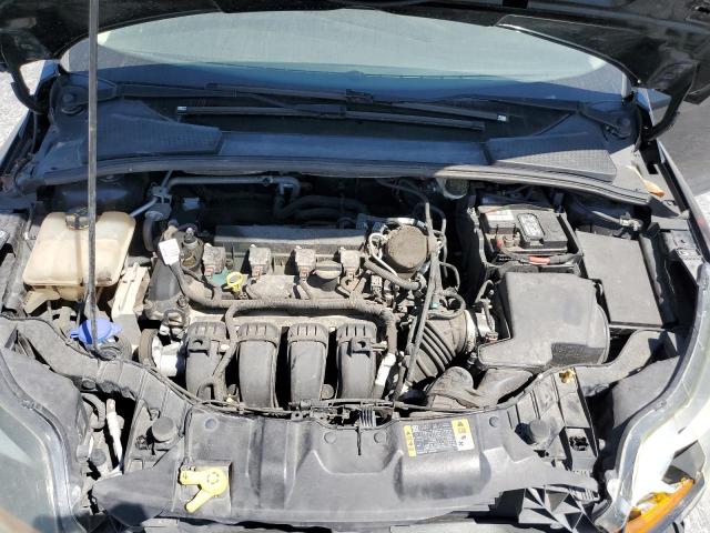 Photo 11 from auction – 2014 FORD FOCUS TITA with VIN 1FADP3J29EL293682