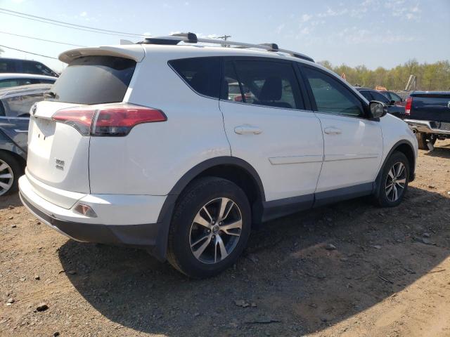 Photo 3 from auction – 2016 TOYOTA RAV4 XLE with VIN 2T3RFREVXGW477524