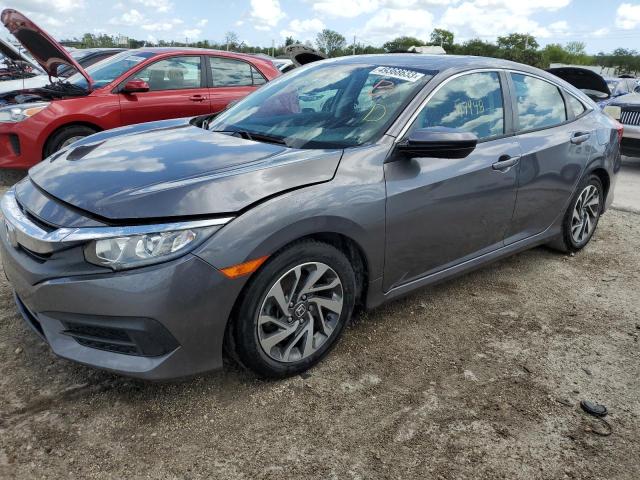 HONDA CIVIC EX 2018 with VIN 19XFC2F78JE010110 - Photo from auction
