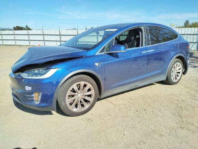 TESLA MODEL X 2018 with VIN 5YJXCAE29JF138452 - Photo from auction