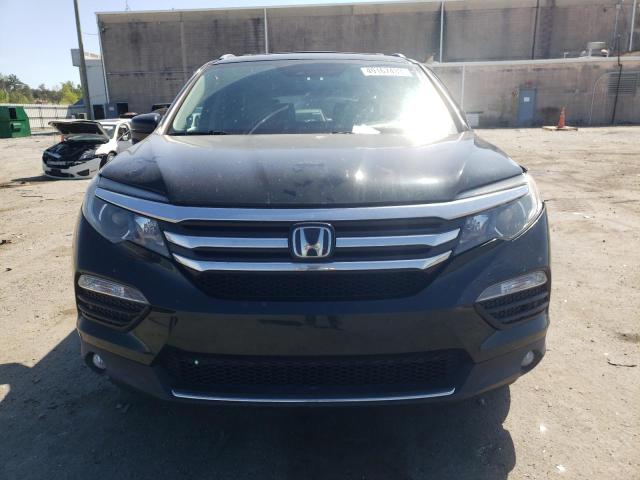 Photo 5 from auction – 2016 HONDA PILOT TOUR with VIN 5FNYF6H98GB101712