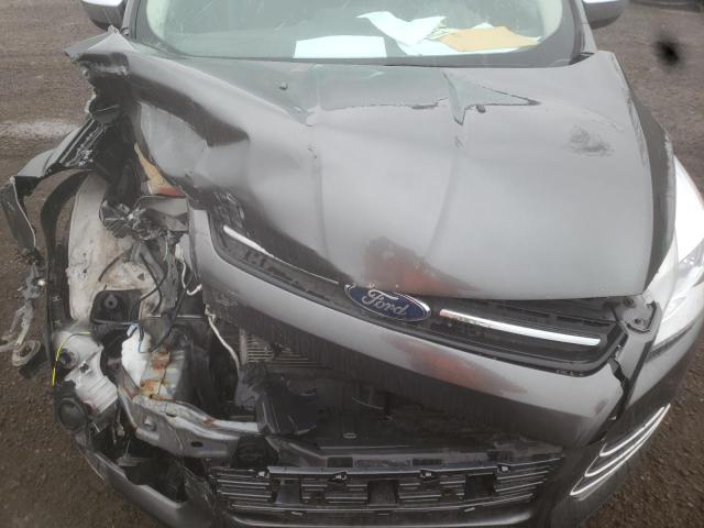 Photo 11 from auction – 2015 FORD ESCAPE SE with VIN 1FMCU9G94FUC16778