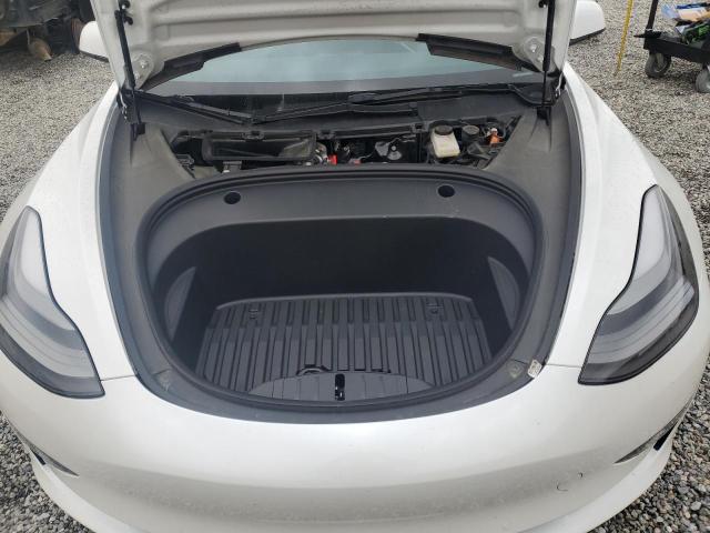 Photo 11 from auction – 2022 TESLA MODEL 3 with VIN 5YJ3E1EB9NF206599