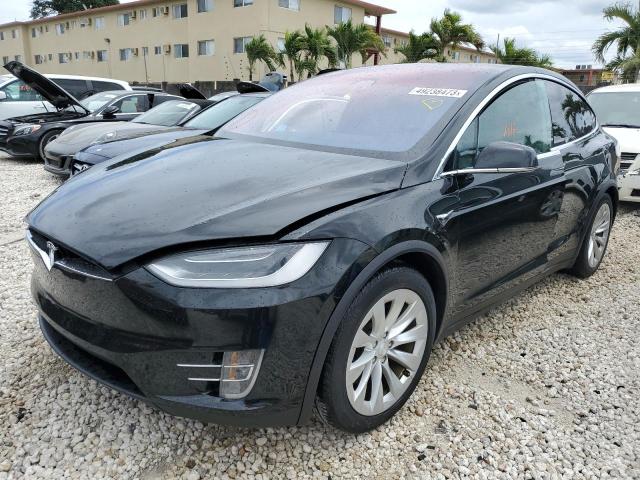 TESLA MODEL X 2017 with VIN 5YJXCDE23HF060942 - Photo from auction