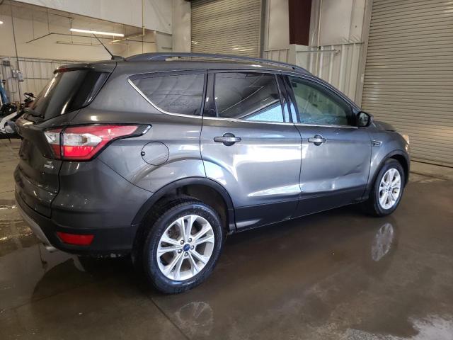 Photo 3 from auction – 2018 FORD ESCAPE SE with VIN 1FMCU9GD9JUA34412
