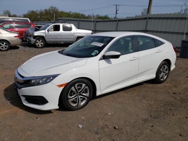 HONDA CIVIC LX 2018 with VIN 2HGFC2F58JH575624 - Photo from auction
