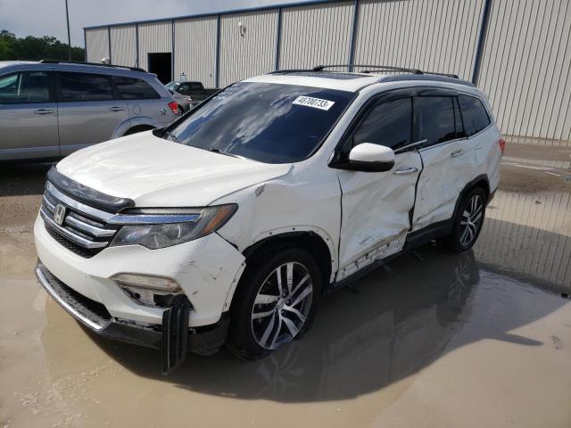 HONDA PILOT TOUR 2016 with VIN 5FNYF5H98GB016346 - Photo from auction