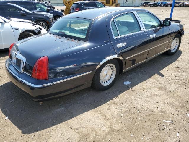 Photo 3 from auction – 1999 LINCOLN TOWN CAR E with VIN 1LNHM81W7XY669205