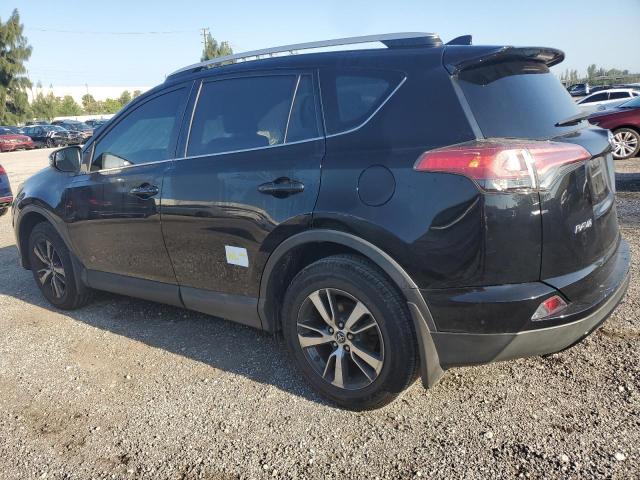 Photo 2 from auction – 2016 TOYOTA RAV4 XLE with VIN 2T3RFREV2GW433713