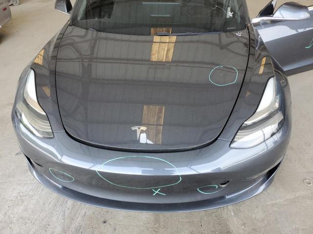 Photo 11 from auction – 2018 TESLA MODEL 3 with VIN 5YJ3E1EA1JF004048