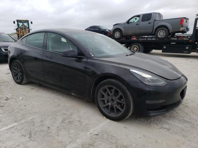 Photo 4 from auction – 2022 TESLA MODEL 3 with VIN 5YJ3E1EB0NF287458