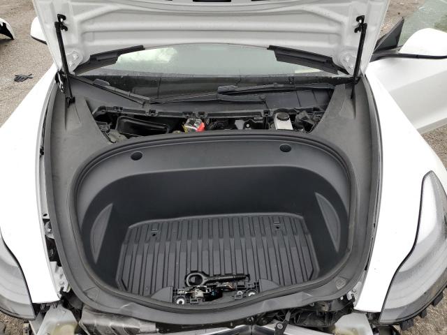 Photo 11 from auction – 2022 TESLA MODEL 3 with VIN 5YJ3E1EB5NF164335